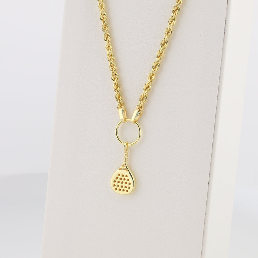 Gold necklace with a padel racket pendant on a white background